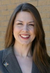 Sheri's old headshot when she was 5 years younger and 30 pounds thinner.